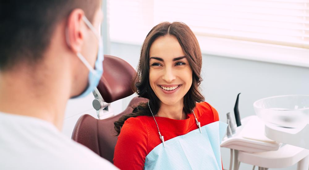 A woman smiling after a Root Canal Therapy in Cloverdale, WA
